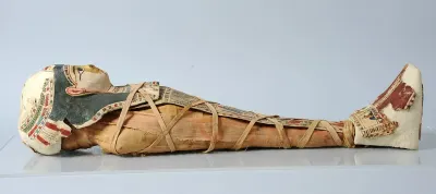 Complete baby mummy with painted cartonnage cover and mask