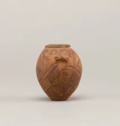 A decorated pottery jar painted with two boats, dating to the Naqada II period (c. 3650 to 3500 BCE). Boat imagery is one of the most charac
